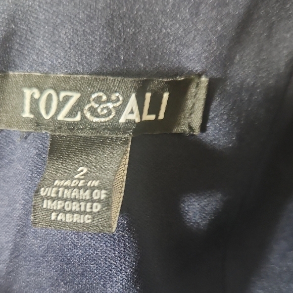 Black and Silver Asymmetrical Jumpsuit with Metallic Embellishments - Picture 2 of 5